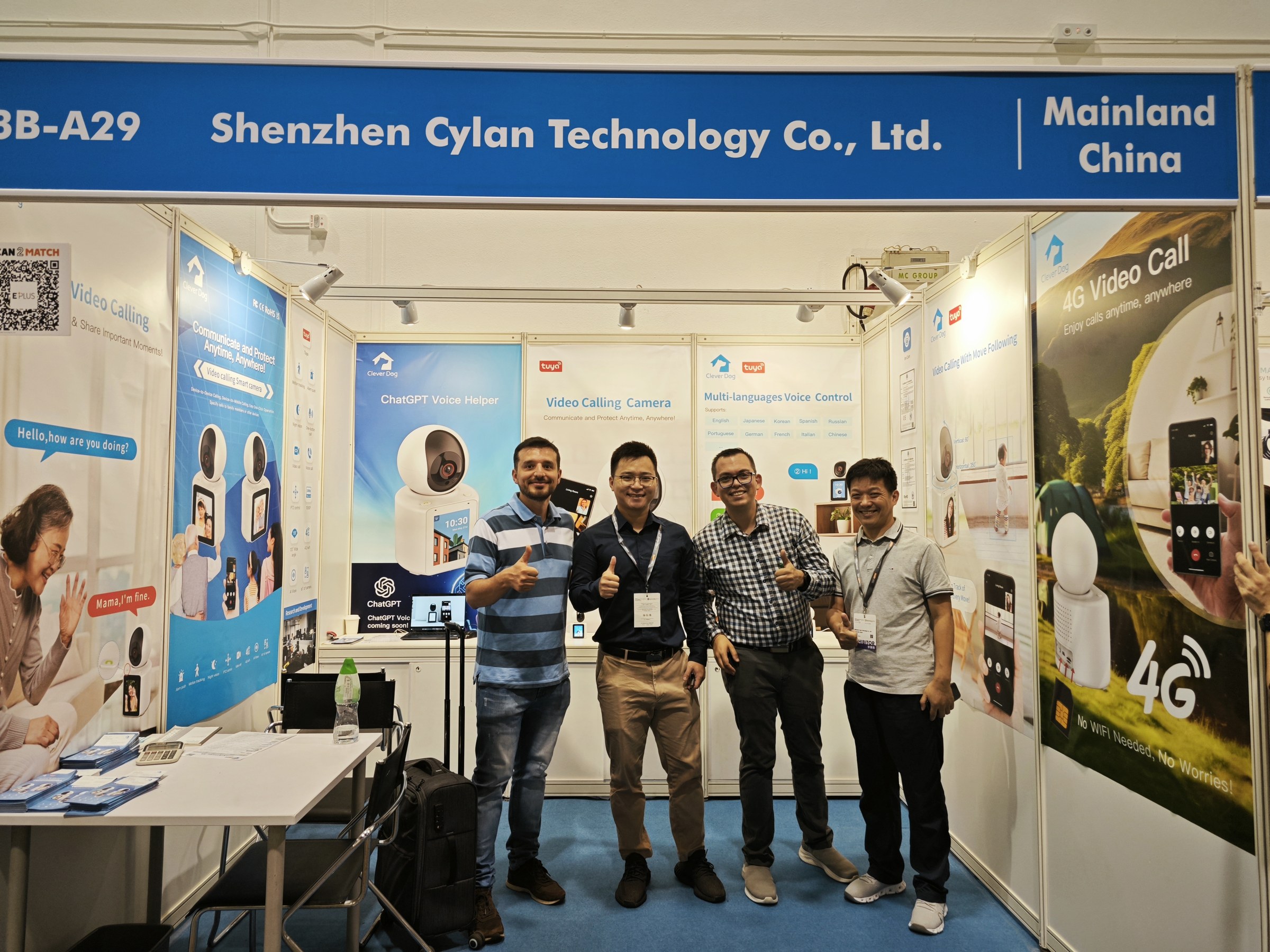 Cylan team and business partners at a branded booth