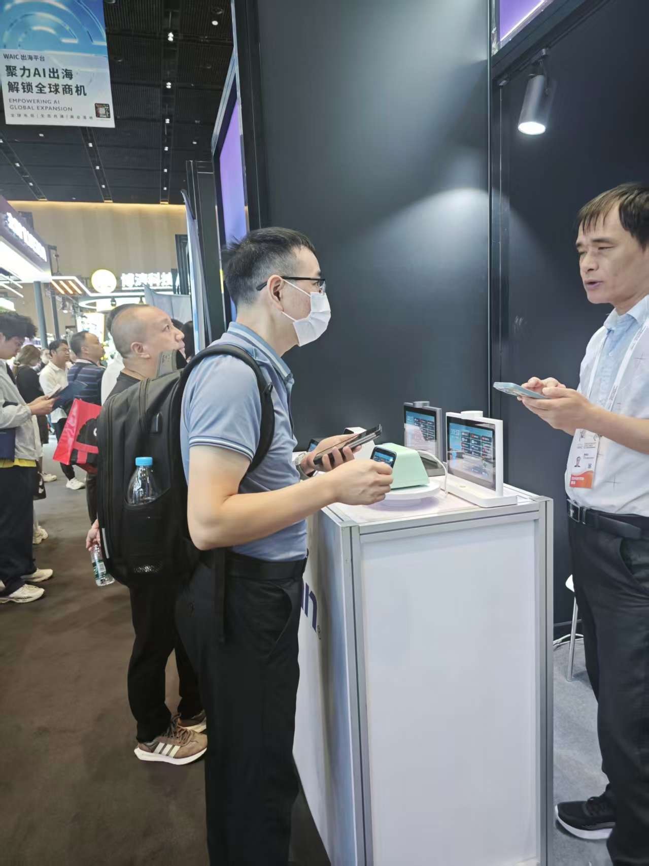 A multilingual business meeting using IM Mate at WAIC 2026